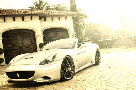 Luxury Ferrari Infront of a Mansion