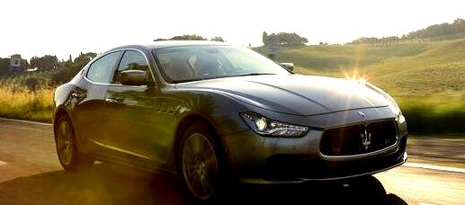 Perfect Maserati Driving Down The Road